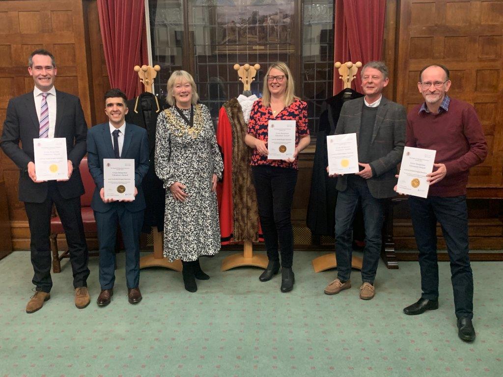 Mayor of Reigate and Banstead celebrates with Level Up volunteers after scooping an award