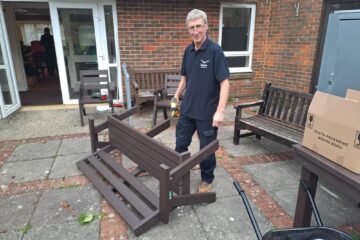 Raven team member building benches