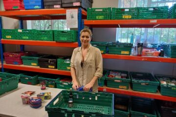 Raven team member at a food bank